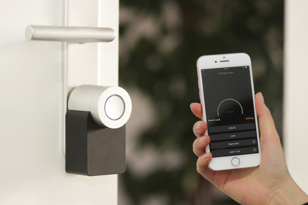 The stylish entryway of a modern home, featuring a beautiful front door equipped with a minimalist smart lock, highlighting home security and technology.